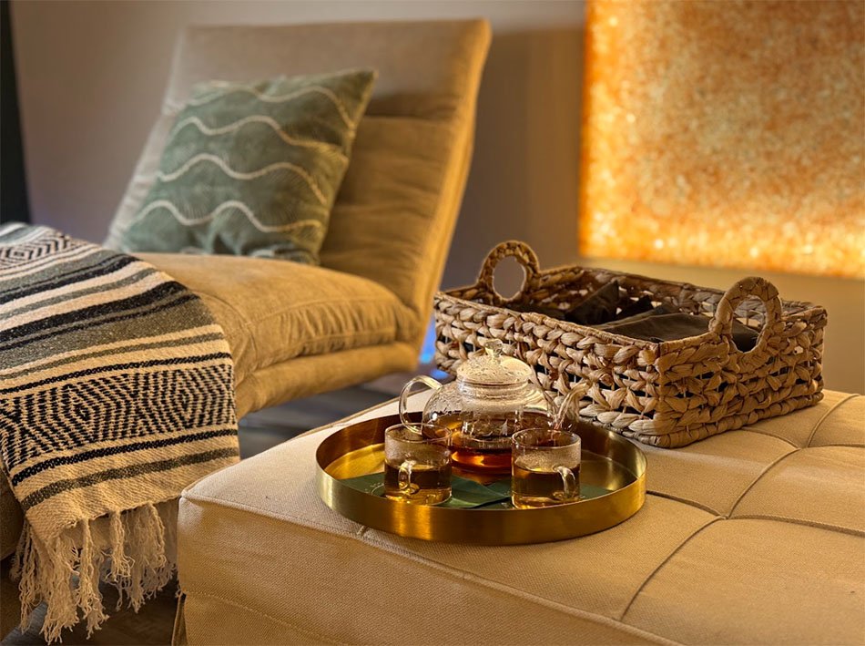 Tea service and blankets in the salt room at Bodhi Salt Center