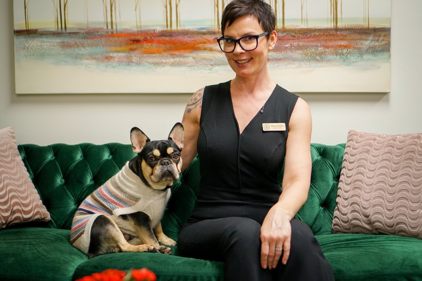 Dasha Grankina, founder of Bodhi Salt Center, with Ozzy the French Bulldog